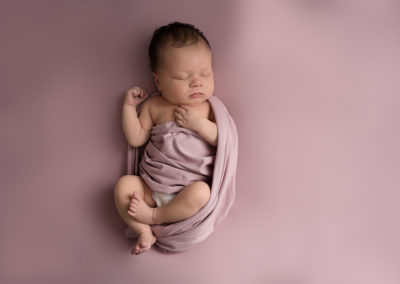 Baby girl asleep taken by Alice James Photography, newborn photographer Hertfordshire