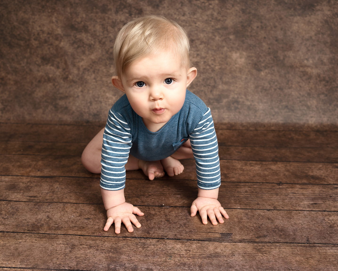 Baby boy about to crawl taken by Alice James Photography