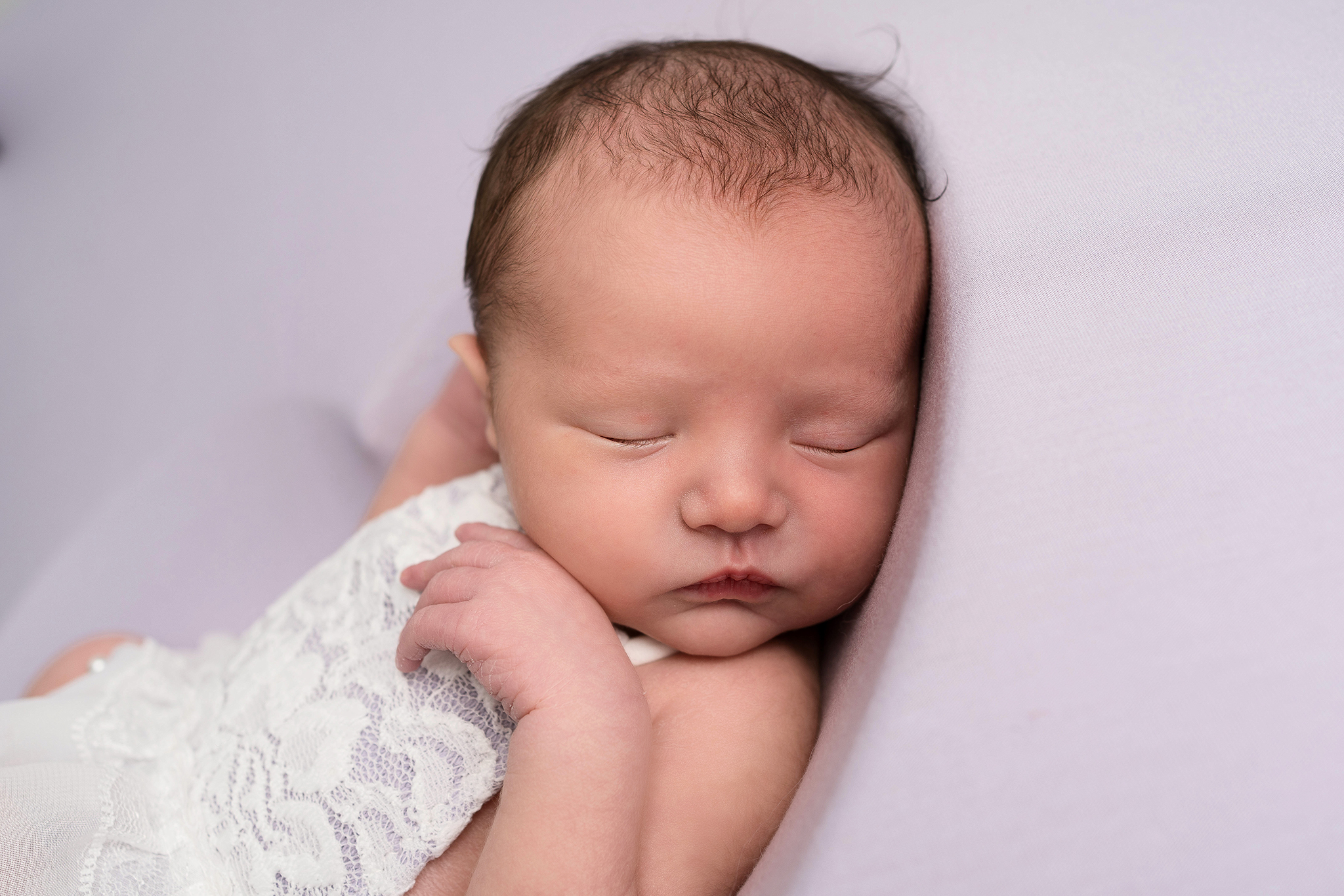 Baby girl wrapped in Pink taken by Alice James Photography, newborn photographer Hitchin
